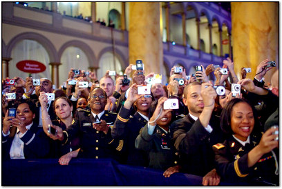 A crowd scrambles to photograph President Obama, 2009