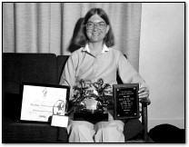Carol Shaw holding River Raid Awards, 1984