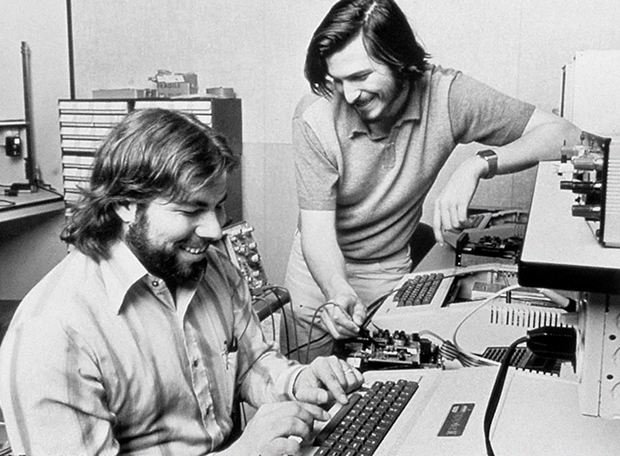 Steve Wozniak and Steve Jobs with an Apple II